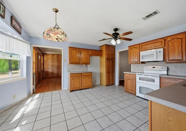 Photo 4 of Single family home for sale at 521 Mccraw Ln, Denison, TX 75021 | MLS# 21358553 | Listing updated on 2026-10-04