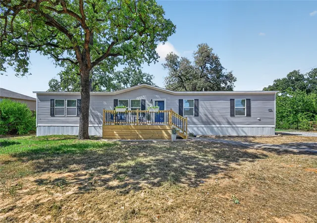 Photo 1 of Manufactured home for sale at 451 Shady Oaks Ln, Little Elm, TX 75068 | MLS# 21354257 | Listing updated on 2026-09-09