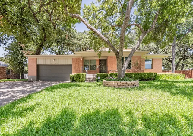 Photo 1 of Single family home for sale at 1233 Fair Oaks Dr, Irving, TX 75060 | MLS# 21357853 | Listing updated on 2026-09-12