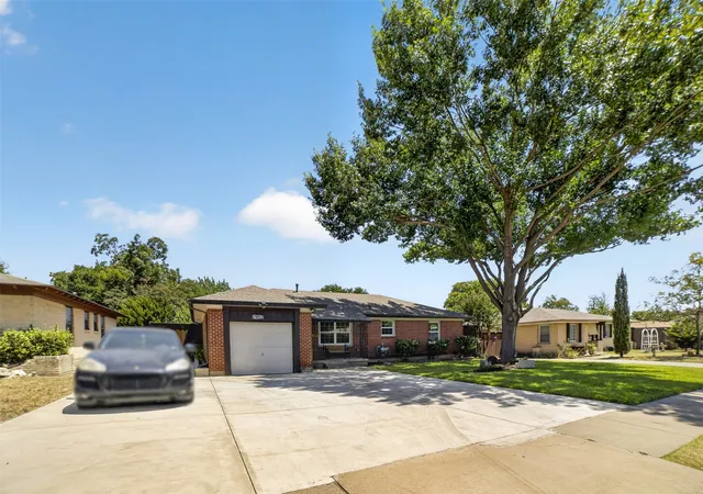 Photo 2 of Single family home for sale at 1912 Oldgate Ln, Garland, TX 75042 | MLS# 21359778 | Listing updated on 2026-09-12