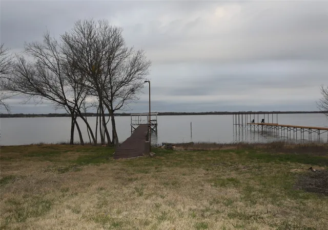 Photo 3 of Single family home for sale at 1020 Crazy Horse, Quinlan, TX 75474 | MLS# 21360920 | Listing updated on 2026-09-07