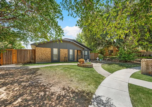 Photo 2 of Single family home for sale at 1706 Delaford Cir, Carrollton, TX 75007 | MLS# 21357373 | Listing updated on 2026-09-13