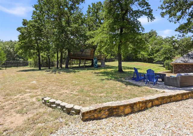 Photo 2 of Single family home for sale at 2010 Woodland Hills Ln, Weatherford, TX 76087 | MLS# 21349376 | Listing updated on 2026-10-03