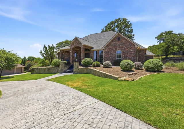 Photo 3 of Single family home for sale at 2010 Woodland Hills Ln, Weatherford, TX 76087 | MLS# 21349376 | Listing updated on 2026-10-03