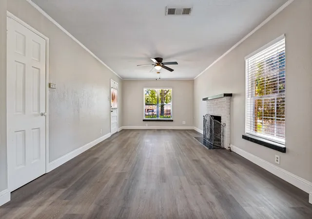 Photo 4 of Single family home for sale at 705 Reverchon Dr, Dallas, TX 75211 | MLS# 21362966 | Listing updated on 2026-09-12