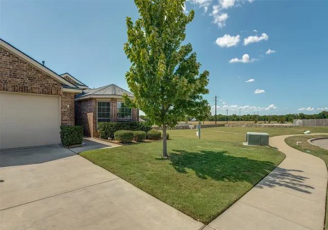 Photo 2 of Single family home for sale at 1412 St Johns Dr, Van Alstyne, TX 75495 | MLS# 21365307 | Listing updated on 2026-09-12