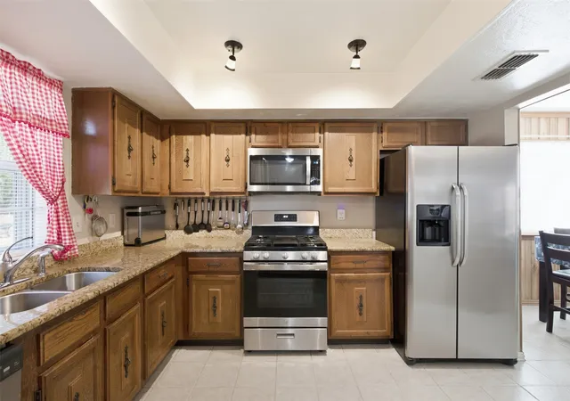 Photo 3 of Single family home for sale at 1822 Caldwell Dr, Garland, TX 75041 | MLS# 21362420 | Listing updated on 2026-09-11