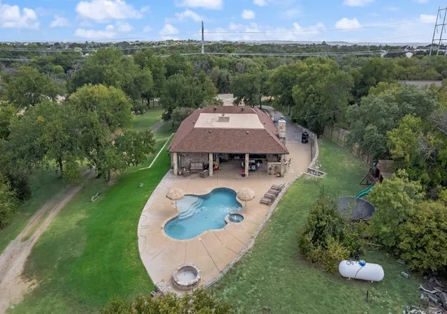 Photo 2 of Single family home for sale at 1205 Florence Dr, Azle, TX 76020 | MLS# 21361943 | Listing updated on 2026-09-12