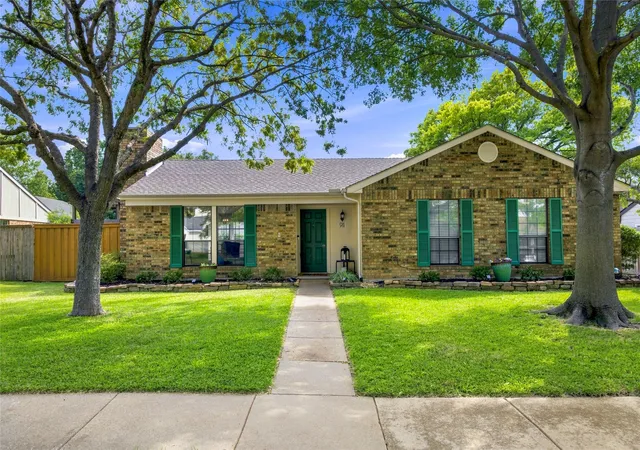 Photo 1 of Single family home for sale at 911 Rolling Brook Ln, Coppell, TX 75019 | MLS# 21355916 | Listing updated on 2026-10-01
