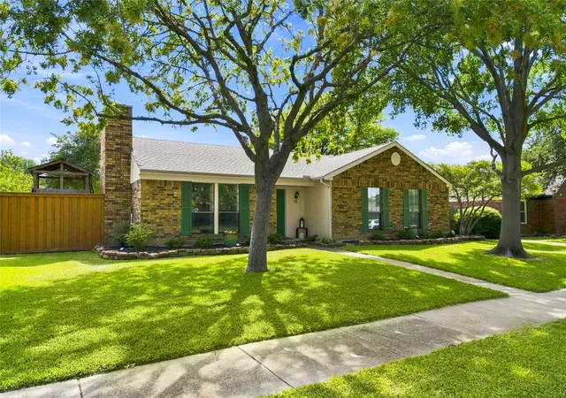 Photo 2 of Single family home for sale at 911 Rolling Brook Ln, Coppell, TX 75019 | MLS# 21355916 | Listing updated on 2026-10-01