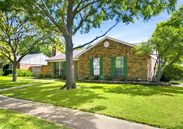 Photo 3 of Single family home for sale at 911 Rolling Brook Ln, Coppell, TX 75019 | MLS# 21355916 | Listing updated on 2026-10-01