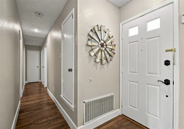 Photo 4 of Single family home for sale at 911 Rolling Brook Ln, Coppell, TX 75019 | MLS# 21355916 | Listing updated on 2026-10-01