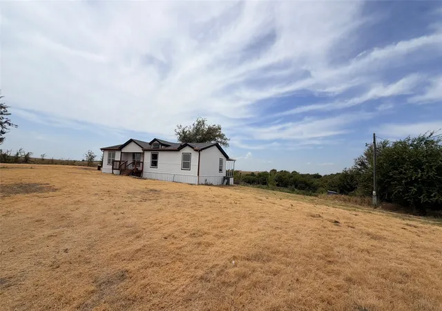Photo 2 of Manufactured home for sale at 716 Coyote Trl, Rhome, TX 76078 | MLS# 21366683 | Listing updated on 2026-09-12