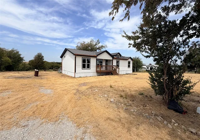Photo 3 of Manufactured home for sale at 716 Coyote Trl, Rhome, TX 76078 | MLS# 21366683 | Listing updated on 2026-09-12