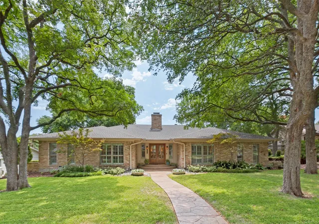 Photo 1 of Single family home for sale at 313 Arborcrest Dr, Richardson, TX 75080 | MLS# 21364609 | Listing updated on 2026-09-11