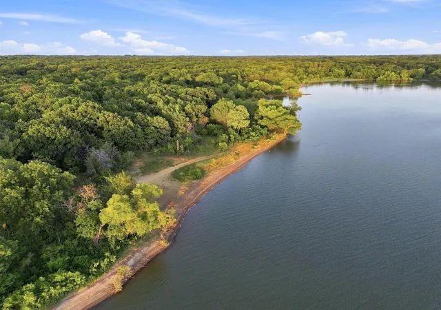 Photo 3 of Single family home for sale at 1027 Paradise Cove Rd, Pottsboro, TX 75076 | MLS# 21369277 | Listing updated on 2026-09-12