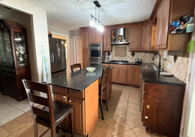 Photo 4 of Sale Pending at 1333 Springlake Dr, Dallas, TX 75217 | MLS# 21371046 | Listing updated on 2026-09-12