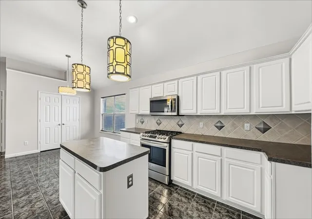 Photo 4 of Sale Pending at 128 Annette St, Lancaster, TX 75146 | MLS# 21371542 | Listing updated on 2026-09-15