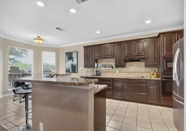 Photo 3 of Single family home for sale at 901 Brittany Dr, Lewisville, TX 75067 | MLS# 21376909 | Listing updated on 2026-09-14