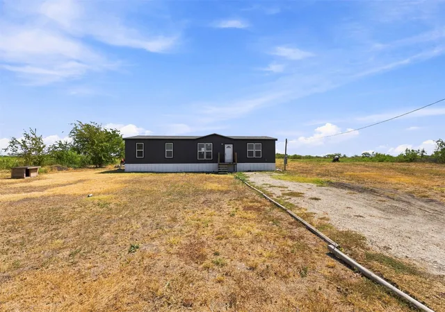 Photo 2 of Sale Pending at 3208 Ne County Rd 0200, Powell, TX 75153 | MLS# 21376455 | Listing updated on 2026-09-17