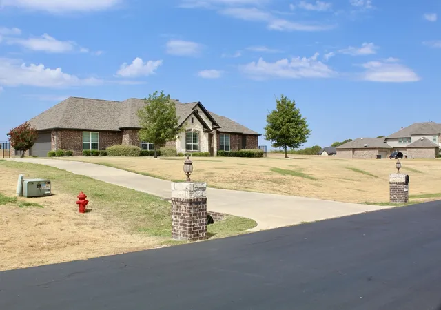 Photo 2 of Single family home for sale at 7061 Whispering Oaks, Mc Kinney, TX 75071 | MLS# 21373069 | Listing updated on 2026-09-14