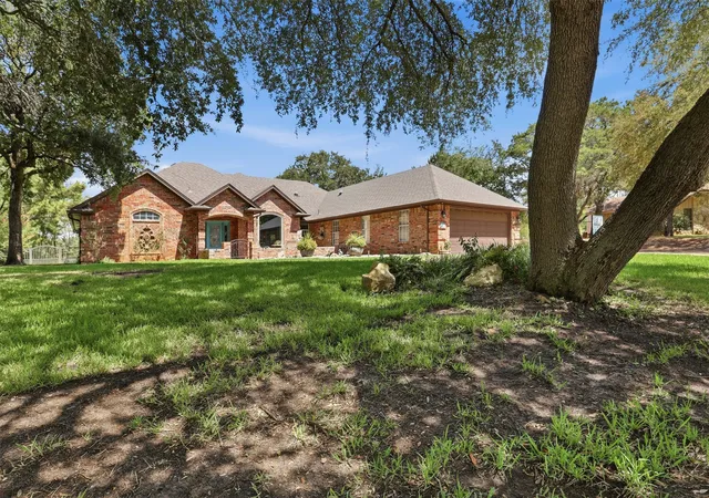 Photo 1 of Single family home for sale at 5004 Mohawk Ct, Granbury, TX 76049 | MLS# 21379530 | Listing updated on 2026-09-12