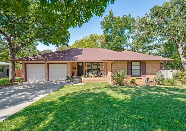 Photo 1 of Single family home for sale at 1403 Greenwood Dr, Denton, TX 76209 | MLS# 21374013 | Listing updated on 2026-09-13