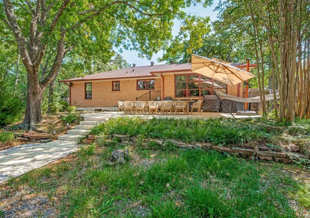 Photo 3 of Single family home for sale at 1403 Greenwood Dr, Denton, TX 76209 | MLS# 21374013 | Listing updated on 2026-09-13