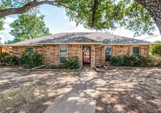 Photo 1 of Sale Pending at 1900 Oakbluff Dr, Carrollton, TX 75007 | MLS# 21379880 | Listing updated on 2026-09-18