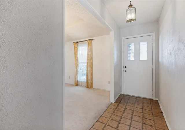 Photo 3 of Sale Pending at 1900 Oakbluff Dr, Carrollton, TX 75007 | MLS# 21379880 | Listing updated on 2026-09-18