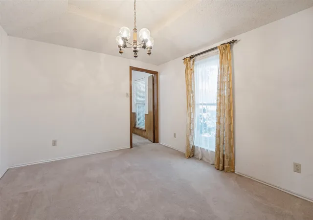 Photo 3 of Sale Pending at 1900 Oakbluff Dr, Carrollton, TX 75007 | MLS# 21379880 | Listing updated on 2026-09-18