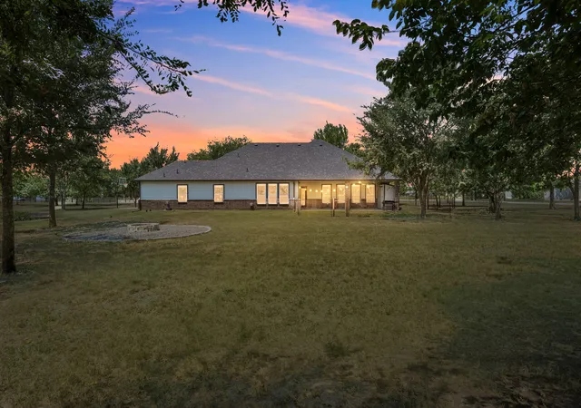Photo 2 of Single family home for sale at 7565 Caddo Crk Rd, Quinlan, TX 75474 | MLS# 21378460 | Listing updated on 2026-09-09