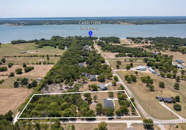 Photo 3 of Single family home for sale at 7565 Caddo Crk Rd, Quinlan, TX 75474 | MLS# 21378460 | Listing updated on 2026-09-09