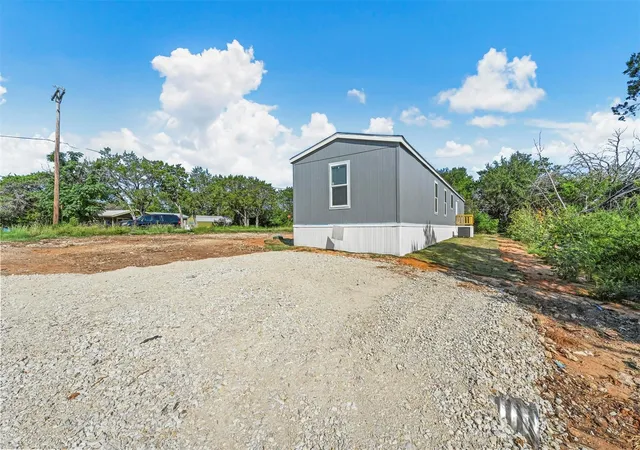 Photo 3 of Manufactured home for sale at 2720 Cypress St, Granbury, TX 76048 | MLS# 21381719 | Listing updated on 2026-09-11