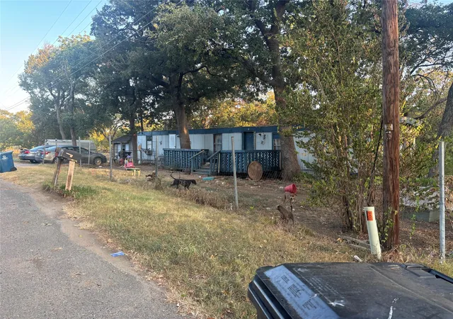 Photo 1 of Sale Pending at 919 E Morgan St, Denison, TX 75021 | MLS# 21382459 | Listing updated on 2026-10-06