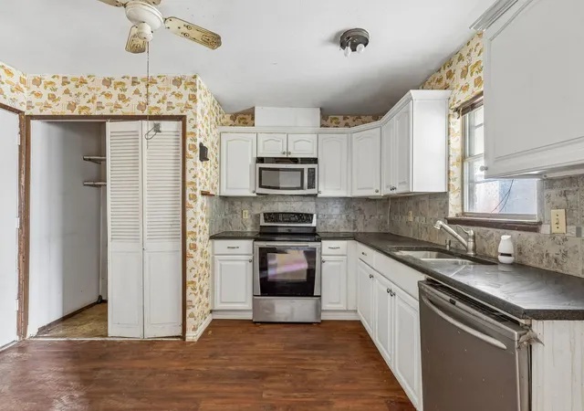 Photo 4 of Single family home for sale at 2217 Lockwood Dr, Carrollton, TX 75007 | MLS# 21382663 | Listing updated on 2026-09-10