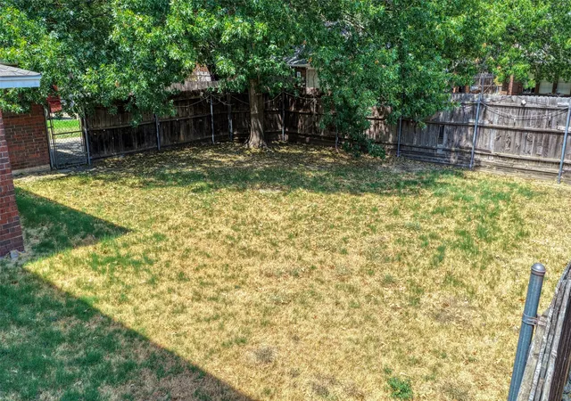 Photo 4 of Single family home for sale at 711 Amesbury Dr, Mesquite, TX 75150 | MLS# 21380252 | Listing updated on 2026-09-10