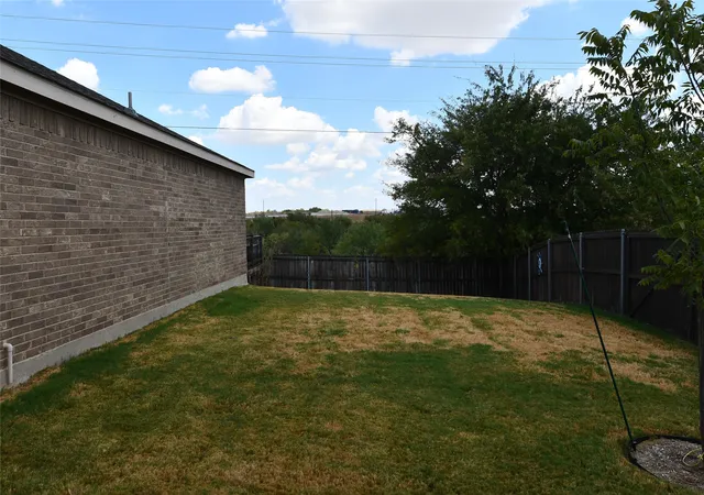 Photo 2 of Single family home for sale at 215 Dodge City Trl, Newark, TX 76071 | MLS# 21380411 | Listing updated on 2026-09-10