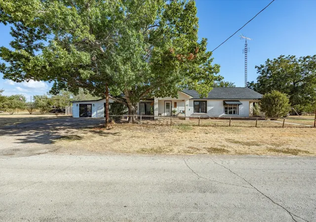 Photo 1 of Single family home for sale at 208 E Church St, Woodson, TX 76491 | MLS# 21378457 | Listing updated on 2026-09-11
