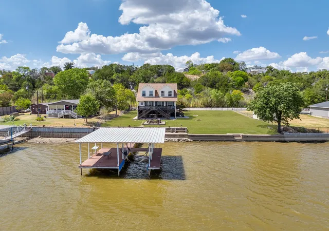 Photo 3 of Single family home for sale at 5901 Parkside Ct, Granbury, TX 76048 | MLS# 21382075 | Listing updated on 2026-09-11