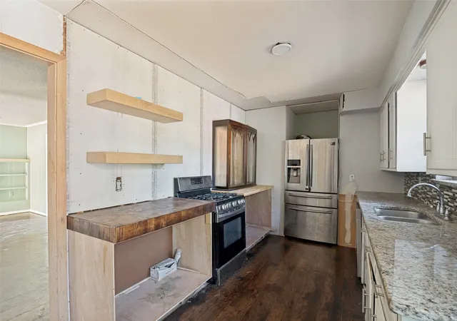 Photo 4 of Single family home for sale at 1717 Douglas Dr, Garland, TX 75041 | MLS# 21381291 | Listing updated on 2026-09-11