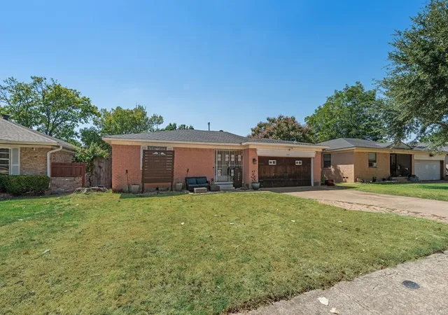 Photo 1 of Single family home for sale at 2219 Mccutcheon Ln, Dallas, TX 75227 | MLS# 21382126 | Listing updated on 2026-09-11