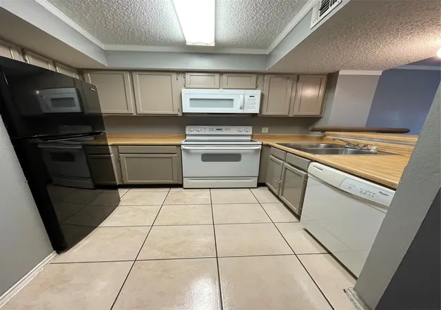 Photo 3 of Condo for sale at 9829 Walnut St #O102, Dallas, TX 75243 | MLS# 21383244 | Listing updated on 2026-09-11