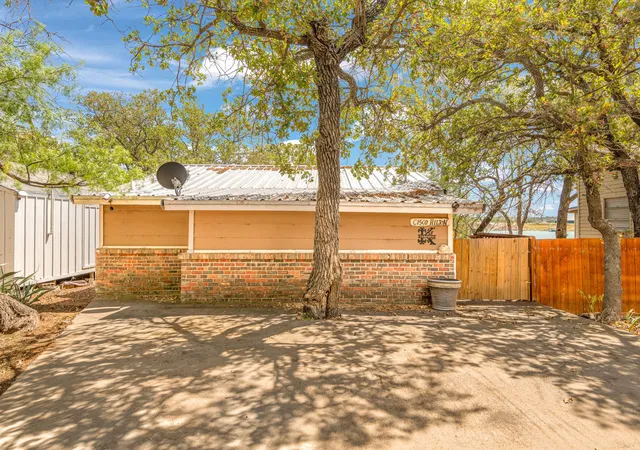 Photo 2 of Single family home for sale at 969 N Shore Dr, Cisco, TX 76437 | MLS# 21383661 | Listing updated on 2026-09-11