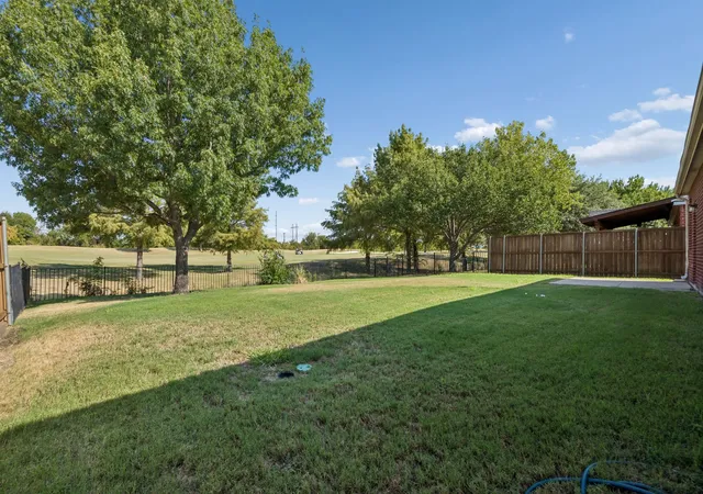 Photo 3 of Single family home for sale at 10617 Gleneagles Ln, Rowlett, TX 75089 | MLS# 21378481 | Listing updated on 2026-09-11
