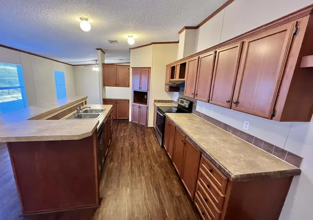 Photo 4 of Manufactured home for sale at 1085 Highland Cir, Springtown, TX 76082 | MLS# 21384061 | Listing updated on 2026-09-12