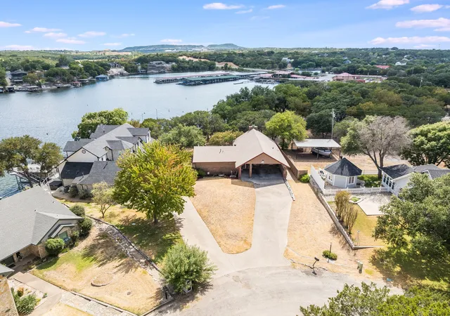Photo 1 of Single family home for sale at 643 S Rough Crk Ct, Granbury, TX 76048 | MLS# 21380931 | Listing updated on 2026-09-12