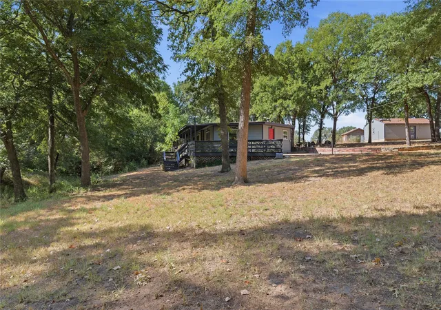 Photo 3 of Single family home for sale at 1001 Green Tree Dr, Weatherford, TX 76087 | MLS# 21384270 | Listing updated on 2026-09-12