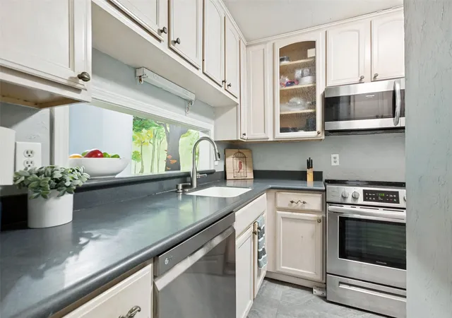 Photo 3 of Condo for sale at 966 S Weatherred Dr, Richardson, TX 75080 | MLS# 21383660 | Listing updated on 2026-09-13