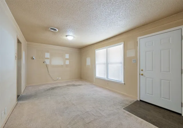 Photo 2 of Single family home for sale at 825 Glenda Dr, Bedford, TX 76022 | MLS# 21384864 | Listing updated on 2026-09-12